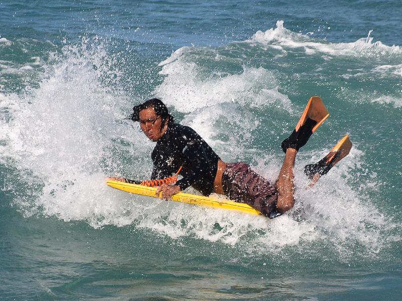 Spinning boogieboarder, Waikiki Beach, Oahu